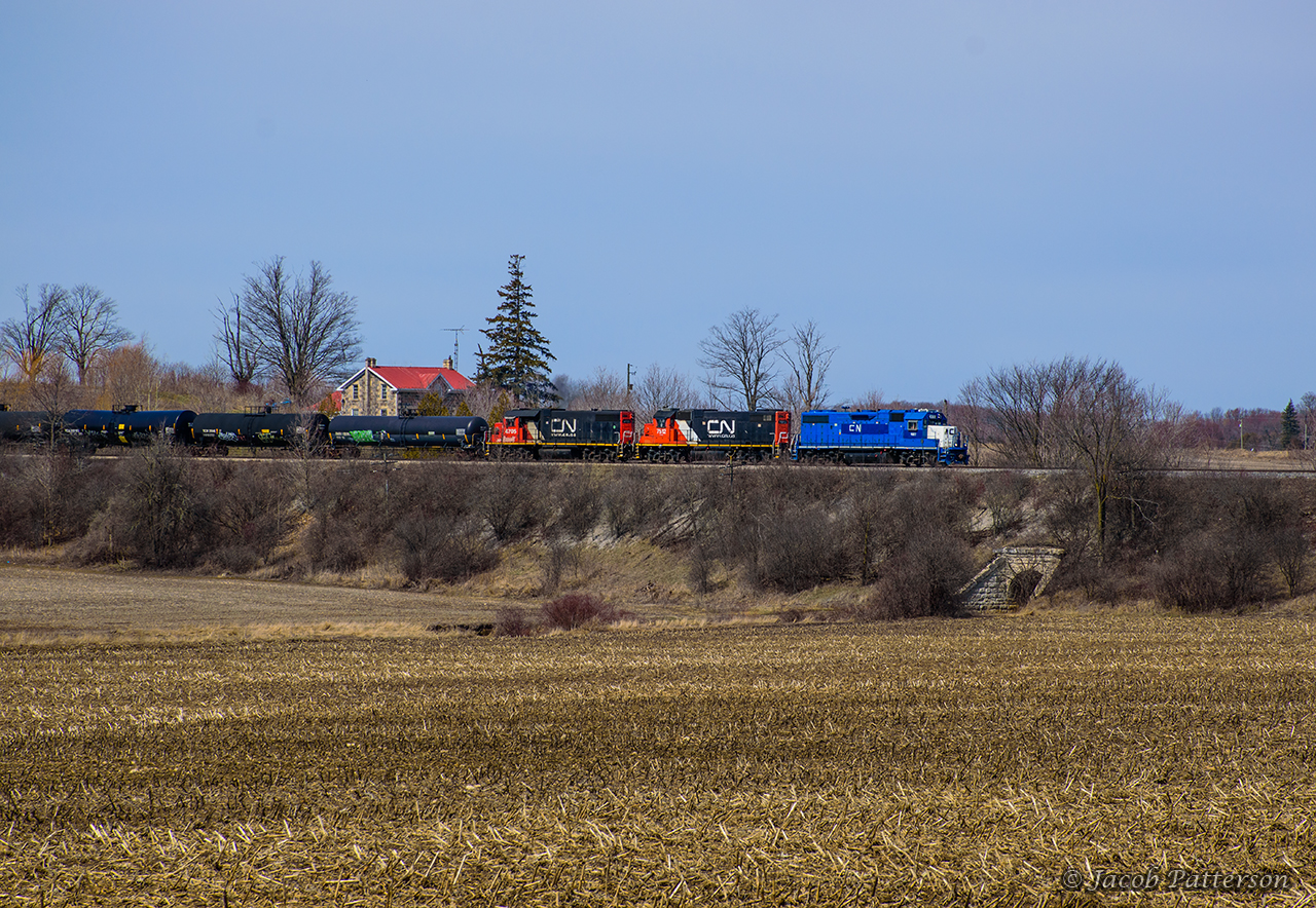 The stonemason's craft is displayed well at Mosborough, with the much-photographed house in the distance, and the 1855 Grand Trunk culvert visible amid the leafless brush.  CN L540 splits the scene on its way to Guelph.