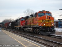 CN 331 with BNSF C44-9W 4696 and CN C44-9W 2578 through St. Catharines on a cold day in March.