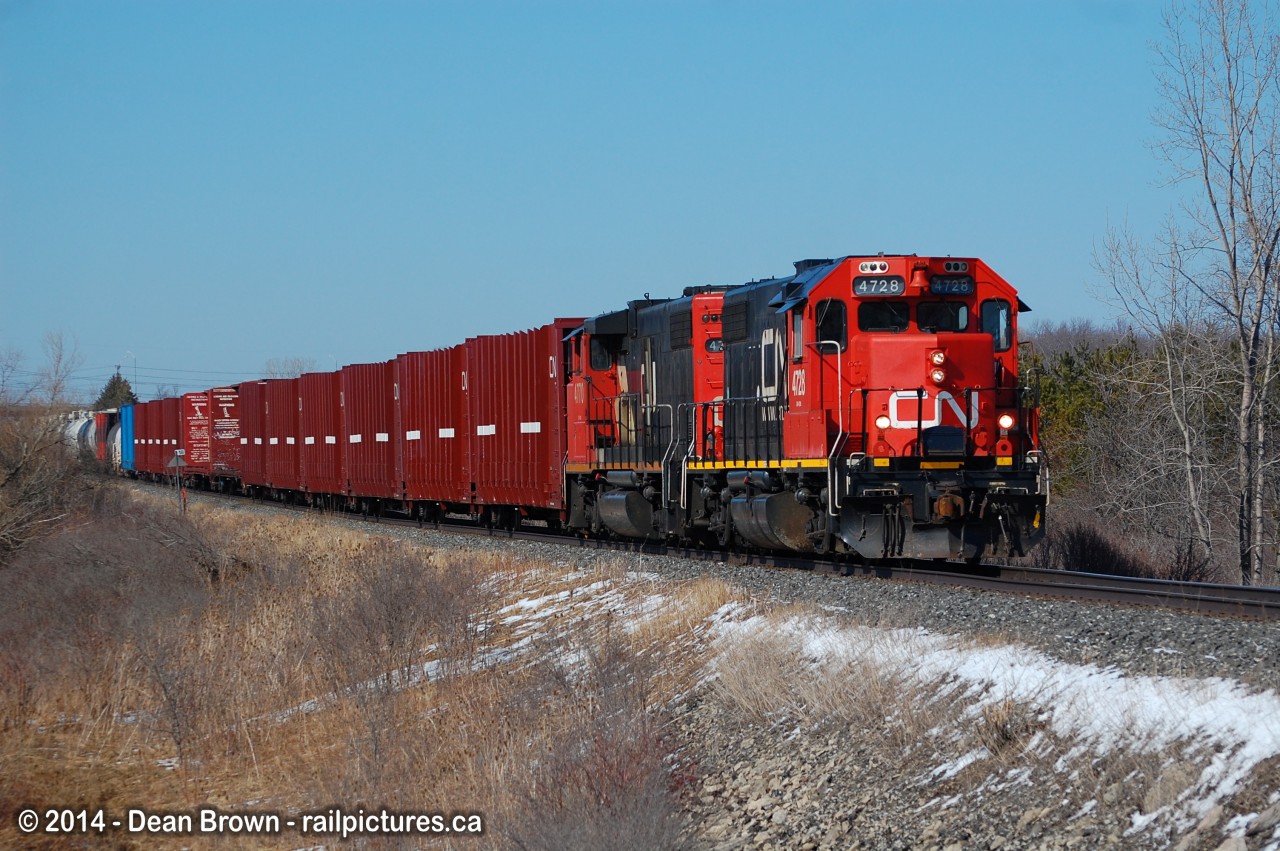 On a sunny afternoon on March 30/2014, CN 562 with CN GP38-2 4728 and CN GP38-2(w) 4770 will stop at Southern Yard before heading to Feeder.