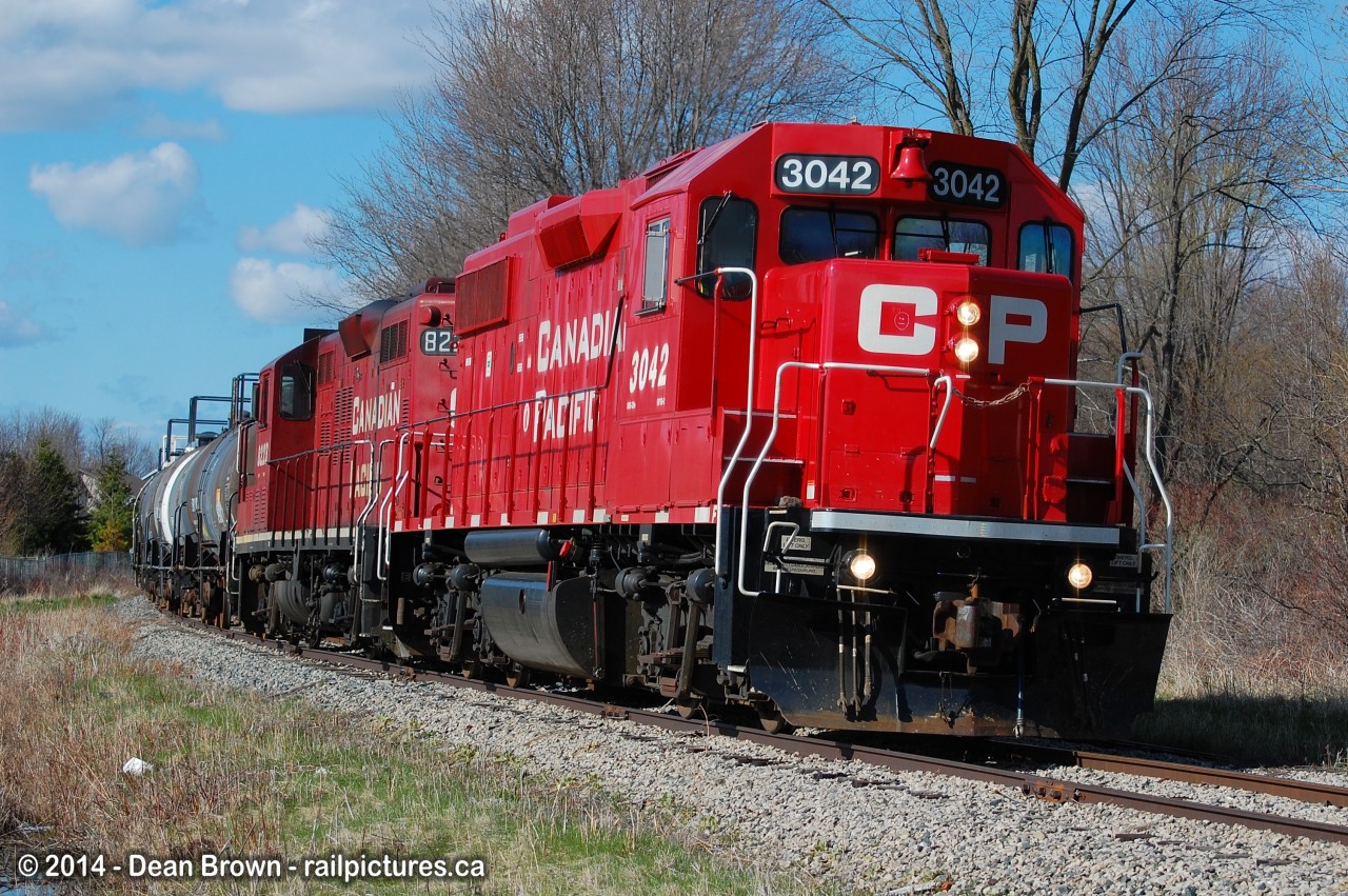 CP TE21 with CP GP38-2 3042 and CP GP9u 8223 arrive in Dunnville heading to Port Maitland on the CP Dunnville Sub.