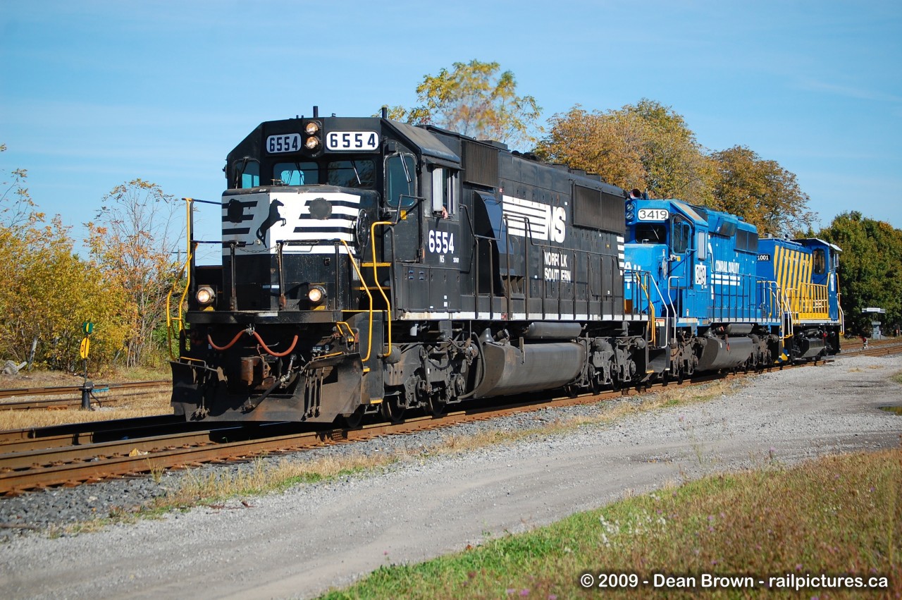 NS 369 with NS SD60 6554, PRR SD40-2 3419, and Port of Montreal RP20BD 1001 in Fort Erie, ON on Oct 2009.