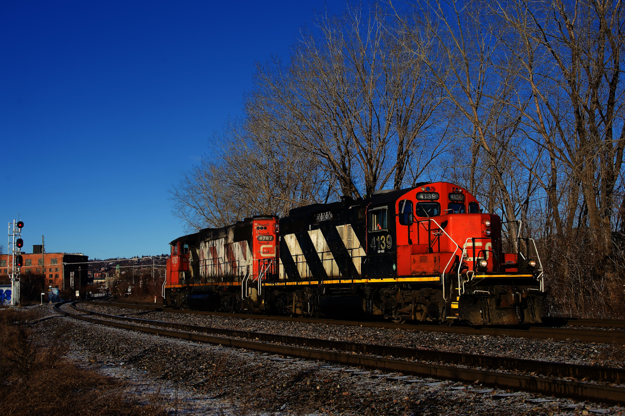 After dropping off two boxcars at Kruger, CN 500's power is heading back to Pointe St-Charles Yard.