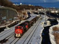 A 588-axle long CN 527 is passing Turcot Ouest with CN 8894 & Cn 2671 for power.