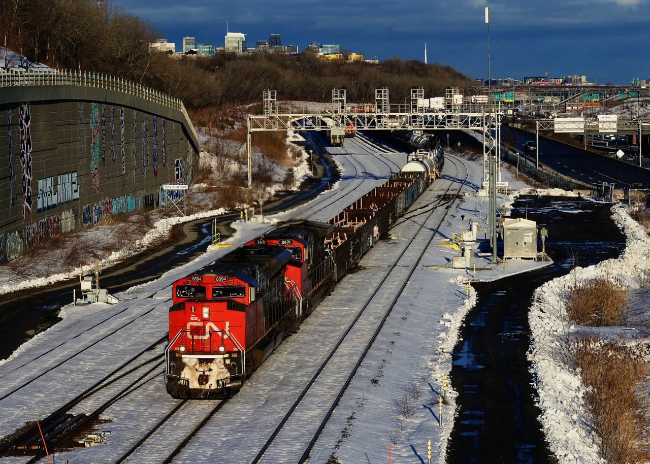 A 588-axle long CN 527 is passing Turcot Ouest with CN 8894 & Cn 2671 for power.