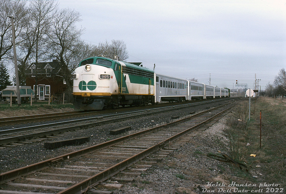 During the first week of operation of GO Transit's new Richmond Hill line, GO APCU 905 leads a 6-car train of single-level Hawkers and GP40-2W northbound on the Bala Subdivision. The train has just crossed John Street in Markham, having crossed Doncaster diamond with CN's York Sub minutes before.

The inaugural train trip and ceremony on the new Toronto to Richmond Hill commuter service took place the previous Saturday (April 29th). This photo on Monday, May 1st 1978 was the first day of regular revenue service.

Keith Hansen photo, Dan Dell'Unto collection slide.