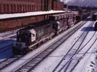 Back in 1973, CN was leasing power while awaiting its GP40-2LWs (deliveries started in March 1974) and receiving GP38-2Ws (delivered from October 1973 to January 1974--source: Canadian Trackside Guide). Here we have GO 9803 and 9804 leading an M420W (delivered earlier that year) through Hamilton on a Sunday morning. GO's GP40TCs were regularly assigned to Fort Erie or Sarnia trains on weekends in the 1970s.  