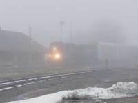 Ontario has suffered ( I really like 4 seasons) through a significant January thaw. The -20 of 10 days ago changed to +3. Warm moist air over the cold ground, and it's fog city. having been in their shoes, I know how hard it is to see signals, and the knowledge of the Hog to know where the crossings are is really put to the test. It's pretty miserable for everyone. I'm about 300 feet from the train. 
