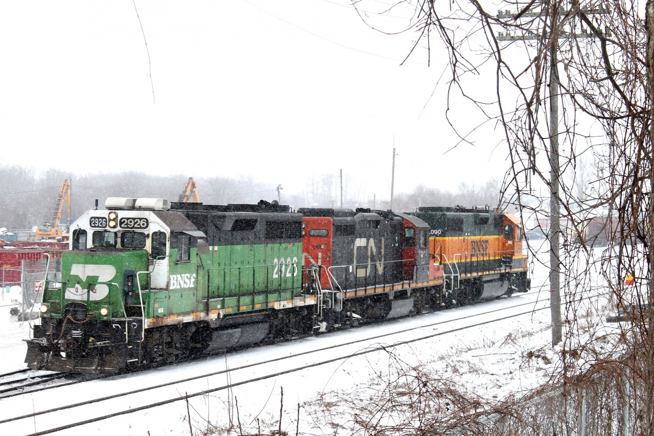 CN 568 couples on to their train with BNSF 2926 leading and BNSF 2090 trailing. In a few minutes they will be on their way to Stratford and later London.