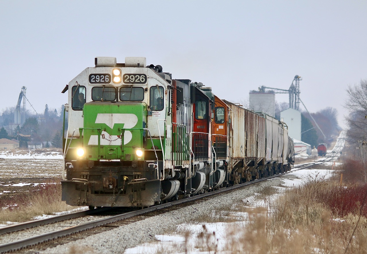 I ended up being apart of the CN 568 “foam fest” yesterday out of Kitchener. I’m not sure how long this lash up will last but was definitely worth the chase to Kelly’s yesterday even though the weather wasn’t the greatest. Here the train is seen digging into the grade on the west side of Shakespeare. A pretty neat sight with 2 BNSF and a repainted GTW.