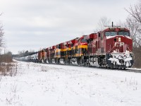 An embarrassment of riches. This train went through Elkhart, Indiana, very early Friday morning, as a 1+1 DPU job. It died somewhere between Woodstock and Ayr yesterday and was parked overnight. (CP had a bad day yesterday...stalls, crews running out of time). So an unexpected treat this morning as  8906, KCS's 5015 4826 4797, CP 8800, BNSF 4466 and UP 5450 nose in DPU rumble through the snow just east of Cambridge. All the colours you could ask for.