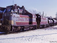 Canadian Pacific's Burlington wayfreight is seen on the Beach Sub just west of Brant Street at Burlington West, ready to depart eastward back to Toronto.   Note the train order signal for Beach Sub movements above the second tank car.<br><br><i>Scan and editing by Jacob Patterson.</i>