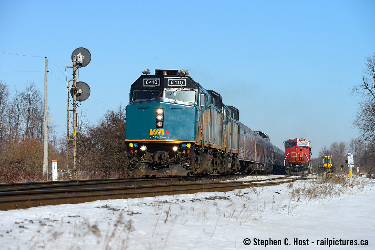 VIA #2 passing the site of the former Pine Orchard station (now a siding) with CN 450 in the hole waiting for a crew before heading to mac yard. I miss sunshine - we've had literally almost none of it here since October in Ontario. Maybe 3-4 days max. This will have to do for now.