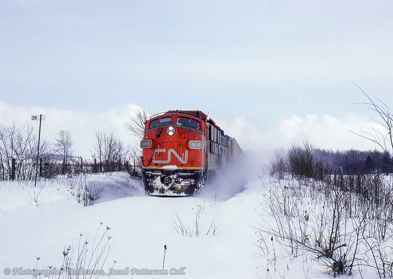 Though noted at 551, this pair of F7us appear to be operating as Extra 9178 west along the Southampton sub, about a mile west of Walkerton at the sideroad 5 crossing.Original Photographer Unknown, Jacob Patterson Collection Slide.