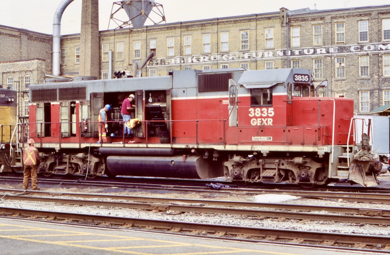 A long time favourite spot for me, I always loved the set up at Kitchener station especially with the H Krug furniture factory as a backdrop. It’s unfortunate that when CN took the subdivision back it moved all motive power to the yard. There was always something going on at the station it seemed, just like this day with GEXR 3835 receiving some mechanical attention and showing off its inners.