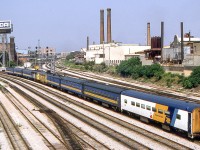 Two train sets have been combined to head west (left) to the VIA maintenance facility in Toronto on July 30, 1987.