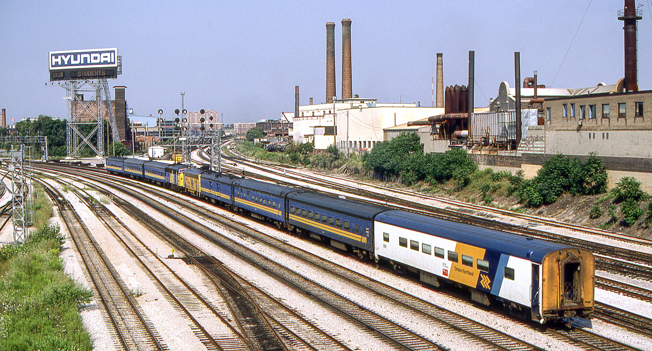 Two train sets have been combined to head west (left) to the VIA maintenance facility in Toronto on July 30, 1987.
