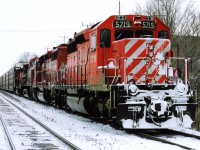 In the day, CP 137 was the correspondent to 138 which was also heavy on autos. On this day, recollection says the crew had suffered a miserable night and had made it the 50 miles from Toronto to Galt before running out of hours. having given up, they've packed it in Kilean Siding where a new crew from London will pick it up in a couple of hours. Apologies for having no details on the specific date or trailing unit power. What few notes I did have, and several hundred slides were lost in a basement flood ten years ago.