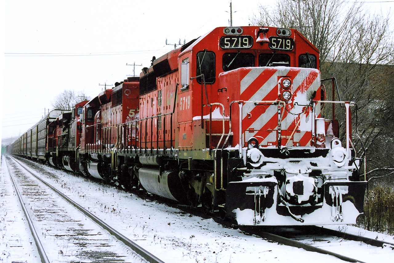 In the day, CP 137 was the correspondent to 138 which was also heavy on autos. On this day, recollection says the crew had suffered a miserable night and had made it the 50 miles from Toronto to Galt before running out of hours. having given up, they've packed it in Kilean Siding where a new crew from London will pick it up in a couple of hours. Apologies for having no details on the specific date or trailing unit power. What few notes I did have, and several hundred slides were lost in a basement flood ten years ago.