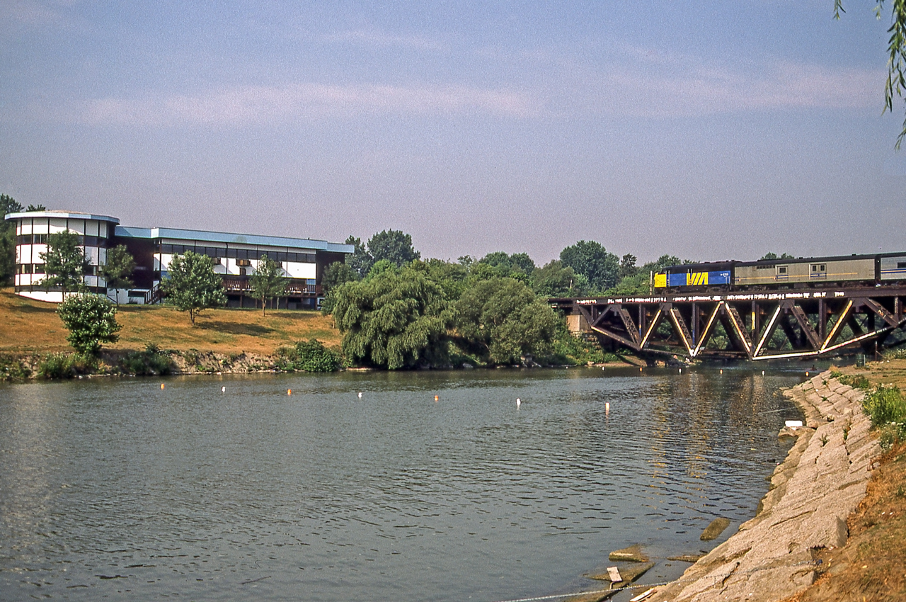 VIA 6768 is crossing the Credit River in Port Credit, Ontario on August 10, 1985.