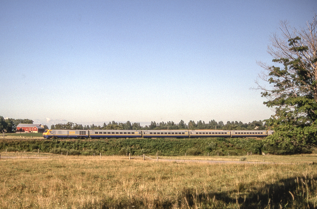 A VIA LRC speeds through Darlington Park, Ontario on August 6, 1987.