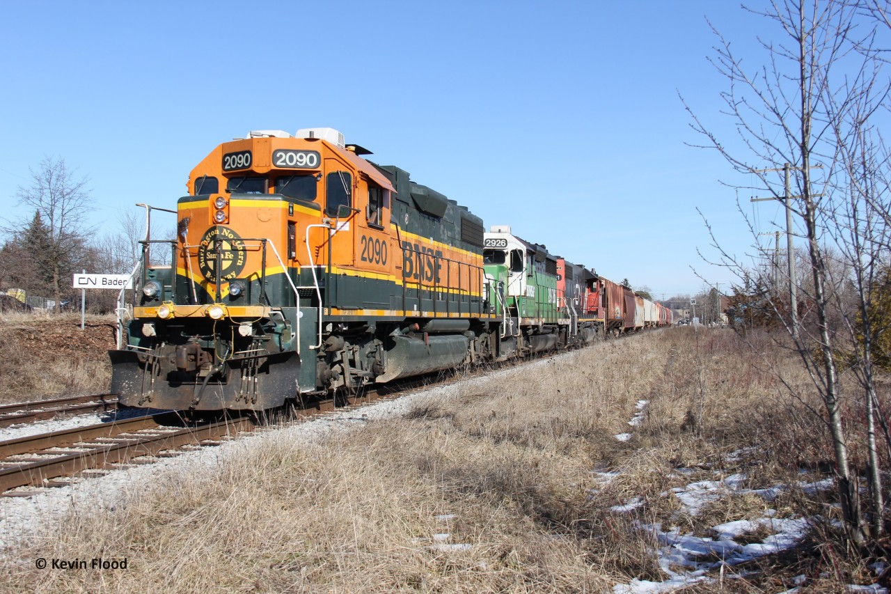 With a short train in tow and little work in Kitchener, CN 568 heads west through Baden, ON at around 13:30 on a nice, sunny, winter day. Power was BNSF 2090-BNSF 2926-CN 7521. It would switch Stratford briefly before carrying on to HCL in London. It is neat to see this kind of power on the Guelph Sub in southern Ontario; it is something more typical of New Westminster, BC (and of course, the U.S.).