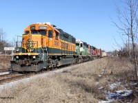With a short train in tow and little work in Kitchener, CN 568 heads west through Baden, ON at around 13:30 on a nice, sunny, winter day. Power was BNSF 2090-BNSF 2926-CN 7521. It would switch Stratford briefly before carrying on to HCL in London. It is neat to see this kind of power on the Guelph Sub in southern Ontario; it is something more typical of New Westminster, BC (and of course, the U.S.).