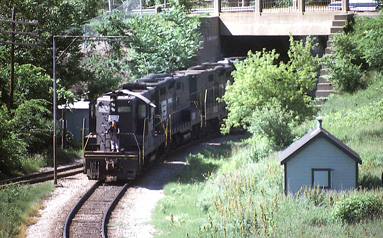 Set of Penn Central units; from front to back in photo, PC 5820, 3819, 3100 and 8100. The location is by King St and the locomotives are backing down into the yard at Chatham St to pick up their train for the Starlite's return to Toronto. Middle pair of units were built as "B" units, without cabs.