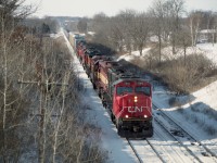 I'm not seeing these days those great lash ups of former years, and I miss them.  I have posted a shot of this train before, but this #394 is worthy of a second offering. This one is of it on approach to Paris West. The power is CN 5618, WC 7518, BNSF 507, 6312, CN 5701, 5603, and 6019.
Beautiful sunny cold day.  Haven't seen many of those kind of days this winter of 2023/24. Strange weather.