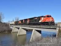  CN 3015 in Support Our Troops camo paint scheme and 3217 with a CN100 logo lead 562 out of Port Robinson and over the Welland River. The train will stop to set-off at Southern Yard before looping around onto the CP Hamilton Sub at Brookfield and passing beneath the Welland Canal to interchange with Gio Rail at Feeder. After lifting interchange from Gio will return via reverse route to Port Rob and attend to any other switching required in the area. 