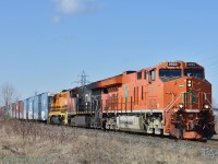  Heading to YYZ and got a text that the CN EJ&E Heritage unit was leading 421. Bailed off the QEW at Beamsville and only had to wait about ten minutes. Sometimes good timing works out. CN (EJ&E) 3023-CN3112-GEXR 3393 pass through Beamsville Ont on the Grimsby Sub. The GEXR SD40-2 was an added bonus. It already went West from Buffalo to Mac Yard and I was told it was supposed to go to the Huron & Eastern in Michigan, but looks like someone decided to send it back to the Buffalo & Pittsburgh. I'm sure it'll be back bouncing around Southern Ontario. This was my first time seeing the 'J' heritage unit. 