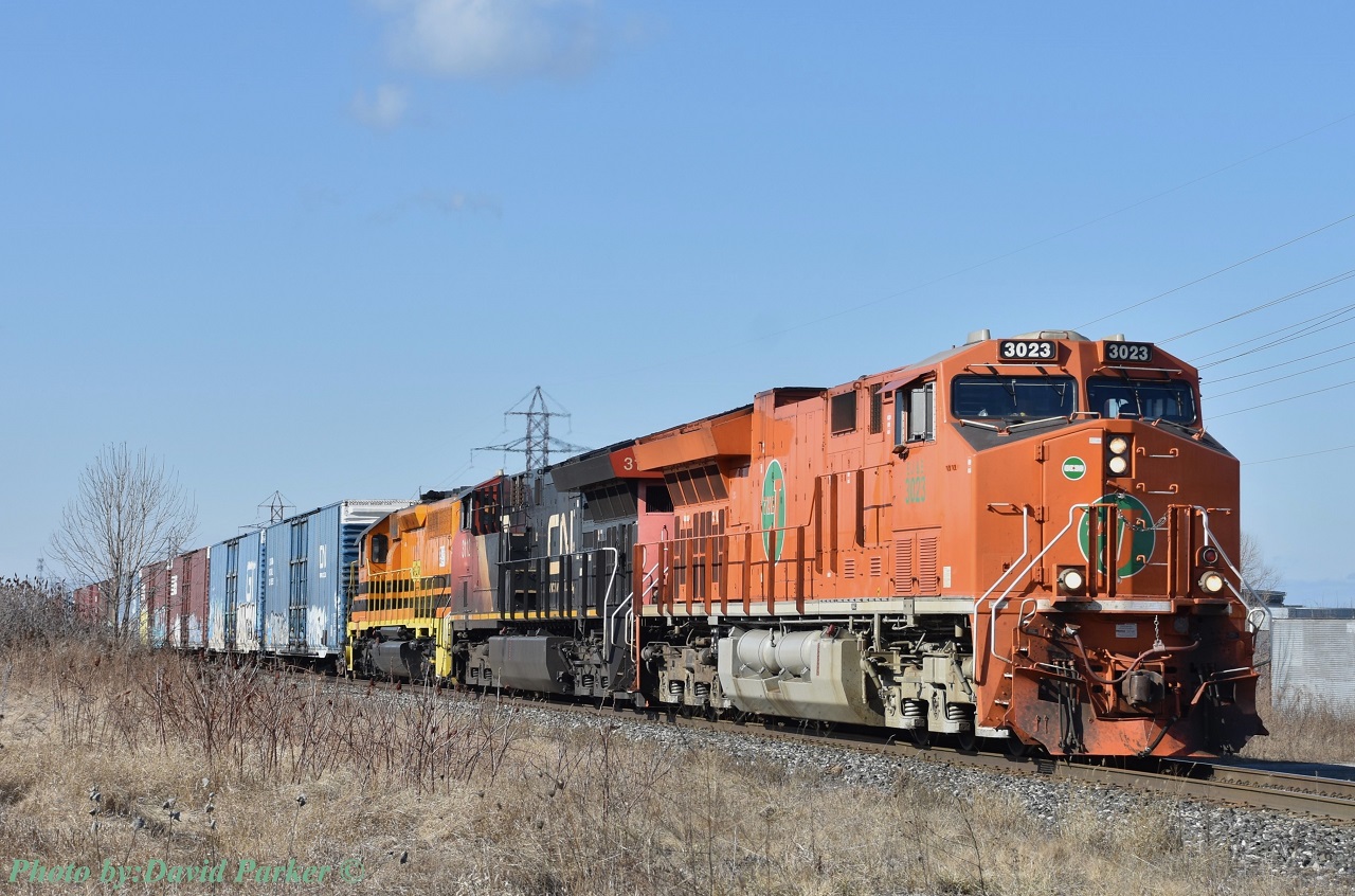 Heading to YYZ and got a text that the CN EJ&E Heritage unit was leading 421. Bailed off the QEW at Beamsville and only had to wait about ten minutes. Sometimes good timing works out. CN (EJ&E) 3023-CN3112-GEXR 3393 pass through Beamsville Ont on the Grimsby Sub. The GEXR SD40-2 was an added bonus. It already went West from Buffalo to Mac Yard and I was told it was supposed to go to the Huron & Eastern in Michigan, but looks like someone decided to send it back to the Buffalo & Pittsburgh. I'm sure it'll be back bouncing around Southern Ontario. This was my first time seeing the 'J' heritage unit.