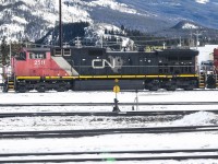 <b>CN North America</b><br>
CN 2511 still wearing its faded CN North America paint and stencil idles away in the yard at Jasper, AB Mile 0.0 Albreda Sub. on January 27, 2024.