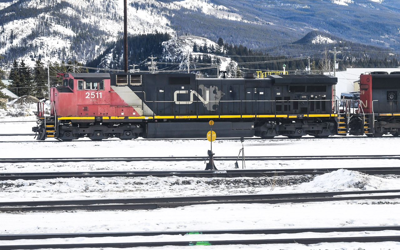 CN North America
CN 2511 still wearing its faded CN North America paint and stencil idles away in the yard at Jasper, AB Mile 0.0 Albreda Sub. on January 27, 2024.