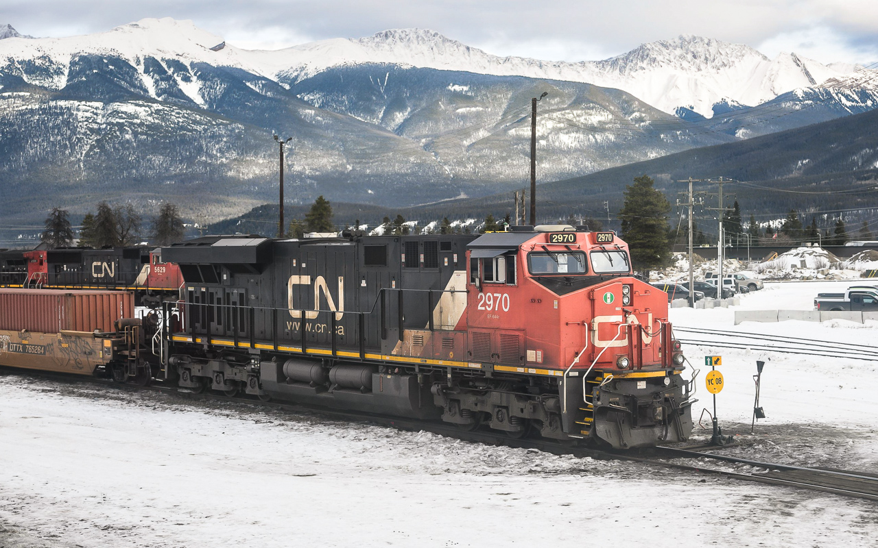 On the Points 
CN 2970 sits on the points of yard track switch YC08 at Jasper, AB Mile 0.0 Albreda Sub. January 27, 2024.
There was plenty of power idling away just outside the CN crew hostel and operations building on this overcast, cool day.