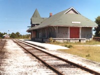 On another of my fathers famous country side excursions, we made our way to the old 1902 CNR Fergus station. Not much happening as evident of the rusted rails, some CNR OCS flat cars and the all too common boarded-up windows of defunct railway stations. As sad as it looks, one could only imagine of what this scene looked like at the turn of the century when trains ruled. Taken from my fathers collection...