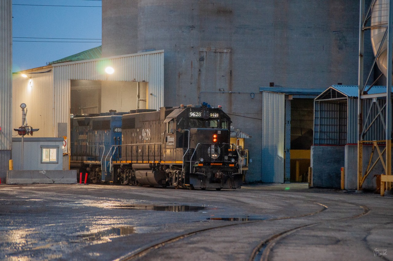 On February 23, 2024, CN 596 serves the customer OI Canada (Owens Illinois Corp), west of VIA Rail's MMC.