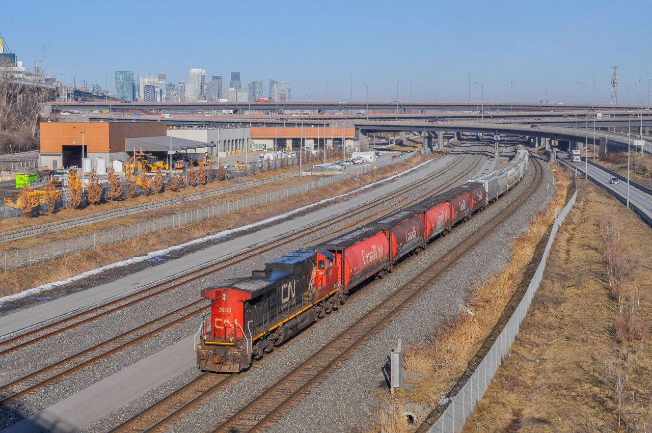 On February 13, 2024, CN 2693 is Long Hood Forward leading the CN L543, with around twenty grain cars.