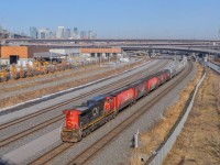 On February 13, 2024, CN 2693 is Long Hood Forward leading the CN L543, with around twenty grain cars.
