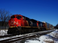 Running slightly later than usual, autorack train CN 271 passes MP 22 of CN's Kingston Sub.