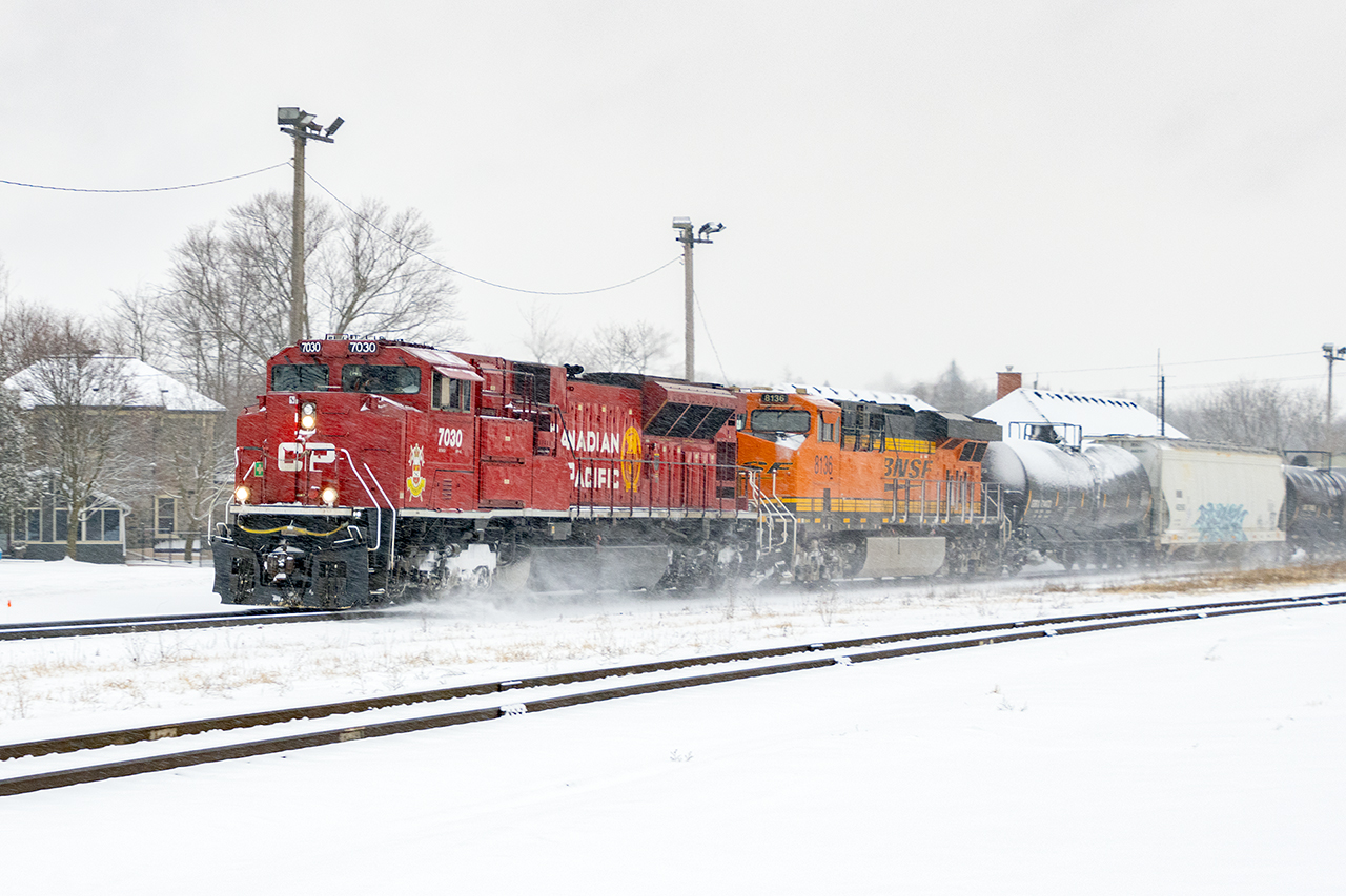 What a difference 48 hours makes. With a new trailing unit, BNSF 8136, 238 stirs up today's recent dusting.