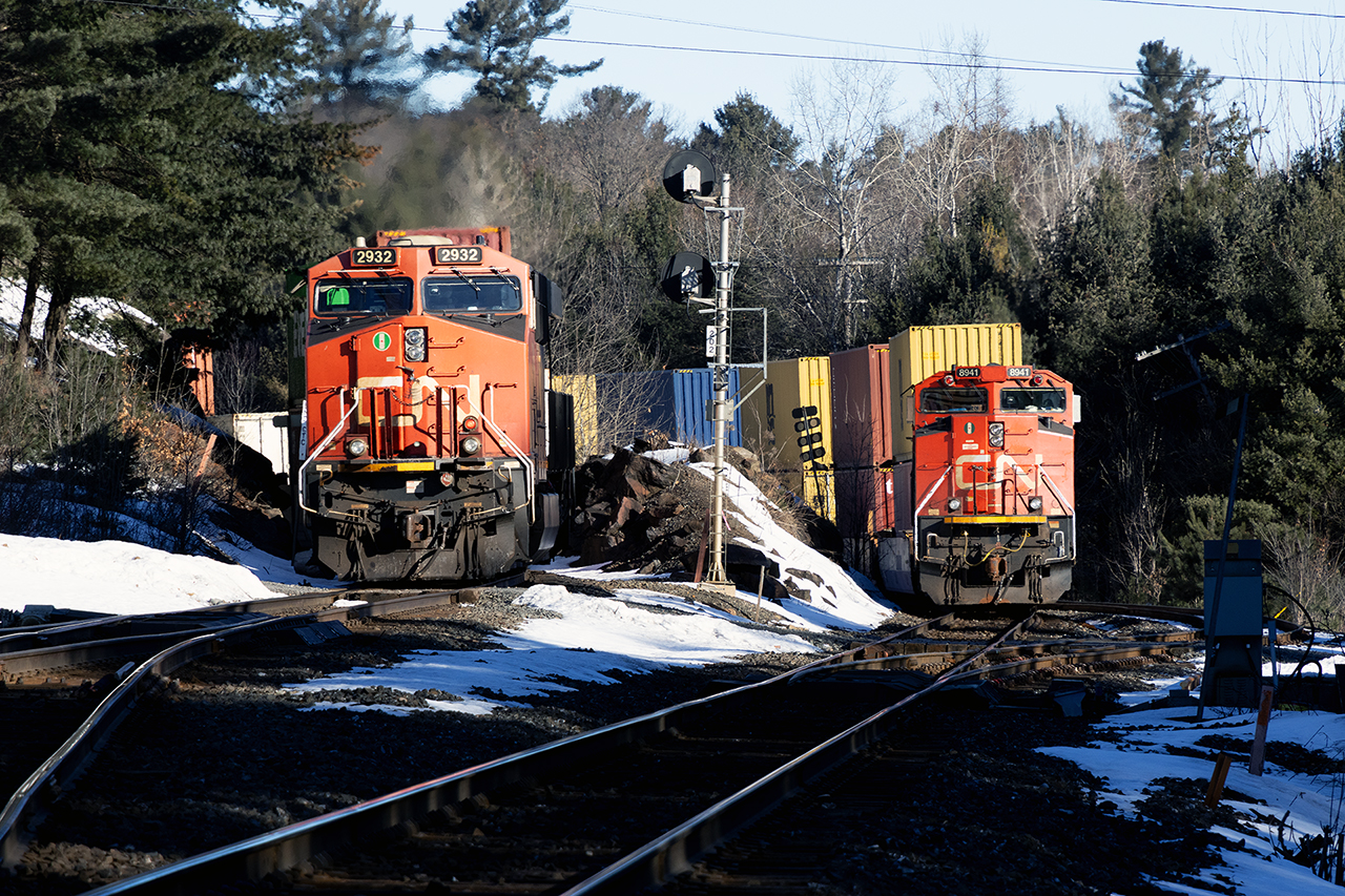 This is why I love nose-out DPU's. 

Ontario is having a pretty much faux-winter, but -18 felt pretty cold at 7am. 8941 pulled through town, and stopped at Boyne. It can't be that long, I thought.....signals lined for a northbound so......2 and half hours later the second monster 1+1+1 takes the crossovers to clear the main....for a crew that I suspect will struggle to avoid an early crew change. I'll never understand the logic in running over siding length in both directions.

My only regret is not offering the crew a coffee run.