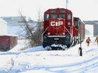 The lighting never played out well when CP switched the north end. This past Friday I received news that the last customer on what remains in service on the former Owen Sound subdivision has finally shut down ending all rail service on the line. I would imagine if CP operates on the line going forward it will only be to just north of the Mississauga Road crossing to use the passing siding, other than that the line is unofficially out of service. Back on February 8, 2014 it was business as usual with not only the boxcar facility needing switching out but the adjacent cover hopper facility requiring work as well. Eventually the warehouse receiving boxcars downsized and relocated, sharing space across the tracks with the other company, usually only receiving one or two boxcars a week. This day factory fresh CP GP20ECO 2266 lead the train as the crew prepares to clean some switches. 