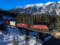 CPKC 2-112 climbs upgrade out of Ottertail.  With only 6 miles remaining of the spectacular Mountain Subdivision before arriving at Field, where a new crew will take the train over the final obstactle British Columbia can throw at the CPR; The Great Divide.  