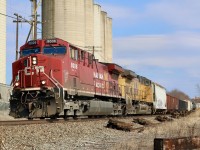 Typically CPKC train 135 travels through the area during the pre dawn hours so it was nice catching it after noon this day. Both CP and UP units are rebuilt AC4400’s with the UP starting life as Southern Pacific 139. The train is seen passing the remnants of removed ADM spur, along with some more recently dumped piles of ties. The Ardent mill is in the background. 