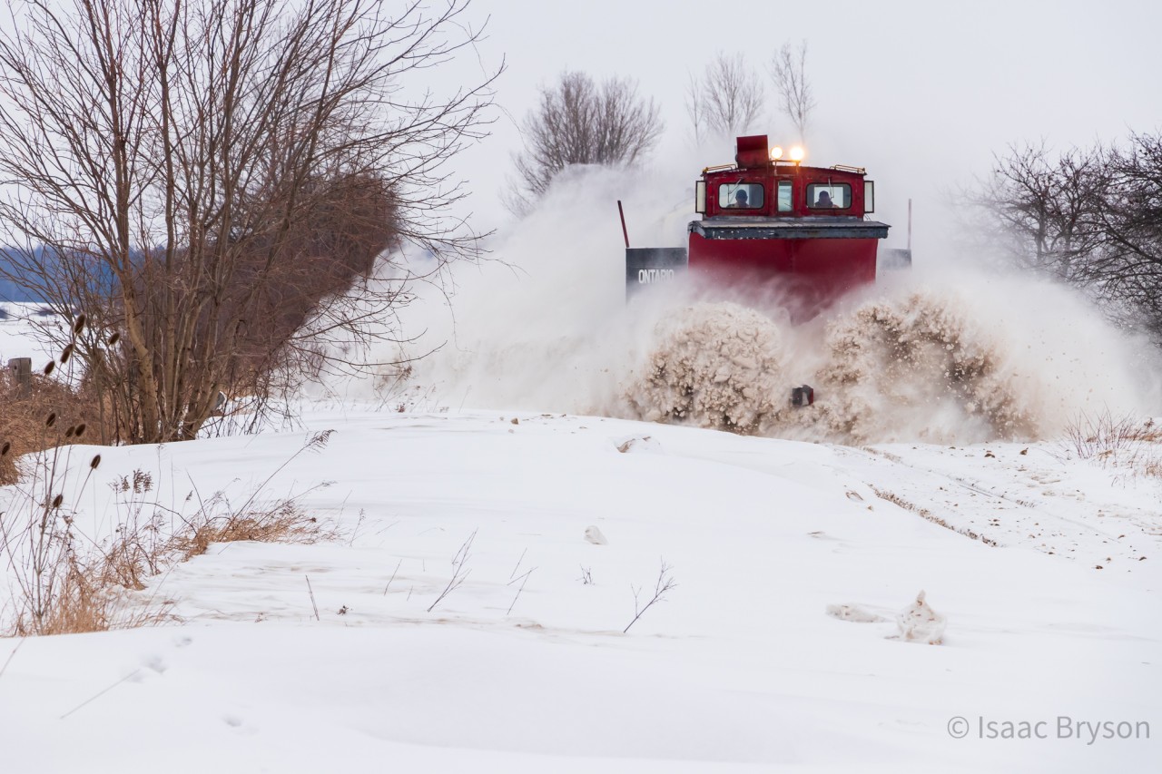 OSR's plow extra train removes snow from the tracks of the Port Burwell subdivision on a mild January morning. At 97 years old, OSR plow 401005 spearheads the operation with help from OSR F units 1401 and 6508. The engines are nearly invisible thanks to the amount of snow kicked up by this unique train.