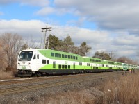 Cab Car GO 307 leads a westbound 12 car GO train as it crosses the demarcation point for the Metrolinx portion and CN portion of the Oakville Subdivision at Mile 32.0, very near the location of the former Burlington (Freeman) station. Next stop Aldershot. 