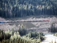 Grain empties descending on the original line. I wonder if this view is even possible 30 years later. Scanned from a print.