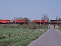 <br>
<br>
 CP Rail 5504 / 4569 / 4727 and a ubiquitous Chessie unit (those were everywhere)
<br>
<br>
 At the west end Lovekin, mile 155.6 Belleville Subdivision, the view from Concession #1
<br>
<br>
 Second 927, May 11, 1985 Kodachrome by S Danko
<br>
<br>
 