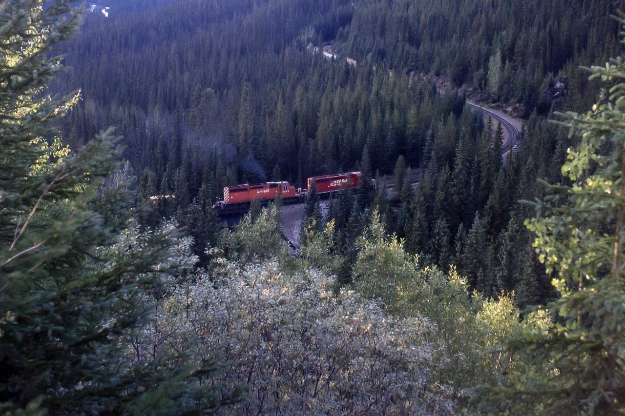 Back in the day, you could still see some of the railroad around the Spiral Tunnels. Crossing the Kicking Horse River at the site of what would be a tragic derailment Feb 4, 2019, 2 SD40-2's in full dynamics hold back westbound containers just above the Lower Tunnel in the heart of some of the most beautiful scenery, but treacherous operating conditions in Canada.