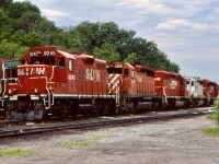 It seemed that the old TH&B Kinnear yard always had something interesting in the yard. While I missed the TH&B days, I was lucky enough to catch the tail end of the 4 axle MLW’s here and a lot of GP9U’s. Road power was always decent too considering the Hamilton subdivision was on of the last divisions across the system to be assigned the new GE’s. This meant a lot of SD40’s and SD60’s ventured through town. Having climbs up the Niagara Escarpment on either side of the city also tested a lot of the motive power CP sent along the line. Basically any train not using trackage rights over CN, typically was assigned 3-8 units just to make sure the train actually made it up the hill.  I’m not sure what the story was this day with this much power sitting in the yard and not tacked onto a train, typically power sitting in this area was either GP9’s or SW1200’s used in the locals. This was a nice treat with StL&H GP9U 8245, non Dash2 SD40 5505, SD40-2 5646, ex KCS SD40-2 5417, and another SD40-2. Who would have thought so many years later and now KCS power is common in Hamilton. 